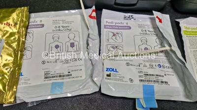 2 x Zoll AEDPro Defibrillators (Both Power Up) in Carry Cases with 2 x 3 Lead ECG Leads, 4 x Zoll Electrodes *3 x Expired*, 1 x Ambu BlueSensor P ECG Electrode *Expired* and 2 x LiMnO2 Batteries *SN AA14H033214 / AA14H033182* - 8