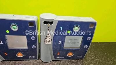 Job Lot Including 2 x Laerdal FR2+ Defibrillators and 1 x Philips FR2+ Defibrillator (All Power Up with Stock Battery Stock Battery Not Included) with 3 x 3 Lead ECG Leads - 4