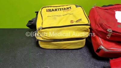 Job Lot Including 7 x Laerdal Defibrillator Cases and 1 x Heartstream Defibrillator Case - 3