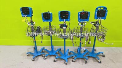 4 x GE Carescape V100 Vital Signs Monitors and 1 x GE Dinamap ProCare Monitor on Stands with 5 x Power Supplies (All Power Up) - 2