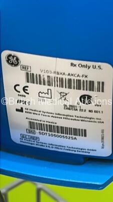 4 x GE Carescape V100 Vital Signs Monitors and 1 x GE Dinamap ProCare Monitor on Stands with 5 x Power Supplies (All Power Up) - 8