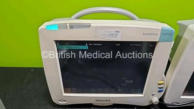 4 x Philips IntelliVue MP50 Patient Monitors (All Power Up, 3 x with Damage to Casing - See Photo) - 5