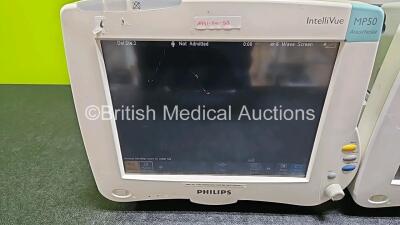 4 x Philips IntelliVue MP50 Patient Monitors (All Power Up, 3 x with Damage to Casing - See Photo) with 3 x Li-ion Batteries - 2