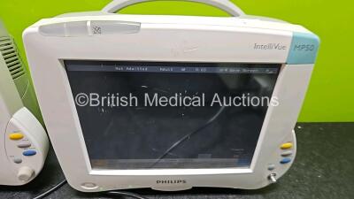 4 x Philips IntelliVue MP50 Patient Monitors (All Power Up, 3 x with Damage to Casing - See Photo) with 3 x Li-ion Batteries - 6