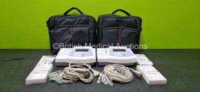 2 x GE MAC 600 ECG Machines (Both Power Up with Stock Power Supply - Stock Power Supply Not Included and 1 x Stuck in Setting) in Carry Bags with 2 x 10 Lead ECG Leads and 4 x ECG Papers *SN SF714100634PA / SF714191199PA*