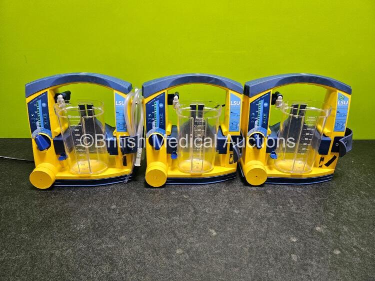 3 x Laerdal LSU Suction Units (All Power Up, 1 x with Crack in Casing - See Photo) with 3 x Suction Cups (All Missing Lids) *SN 78071858794 / 78061577043 / 78122081772*