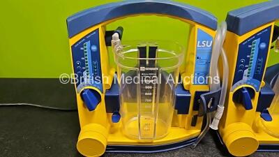 3 x Laerdal LSU Suction Units (All Power Up, 1 x with Crack in Casing - See Photo) with 3 x Suction Cups (All Missing Lids) *SN 78071858794 / 78061577043 / 78122081772* - 2