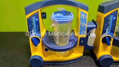 3 x Laerdal LSU Suction Units (All Power Up, 2 x with Cracks in Casing - See Photos) with 3 x Suction Cups, Hoses and 3 x Batteries - 2