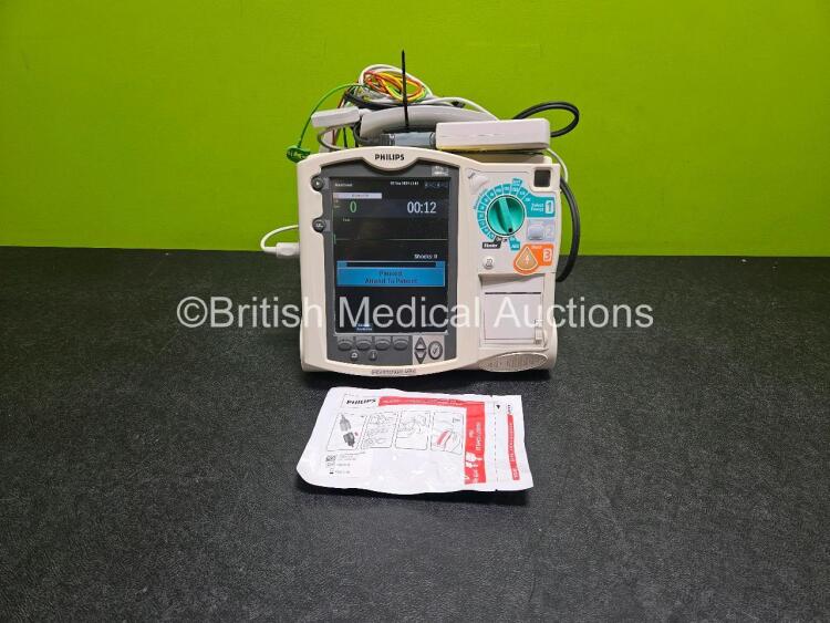 Philips Heartstart MRx Defibrillator (Powers Up) Including ECG and Printer Options with M3725A Test Load, Philips M3539A Module, Philips M3538A Li-Ion Battery and 3 Lead ECG Lead