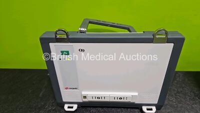 GS Corpuls3 Slim Defibrillator Ref : 04301 (Powers Up, Missing Hinge on Handle) with Corpuls Patient Box Ref : 04200 (Powers Up, Some Options Missing - See Photo) with Pacer, Oximetry, ECG-D, ECG-M, CO2, CPR, NIBP and Printer Options and Corpuls Display U - 5