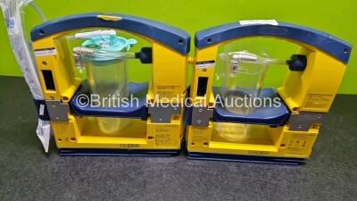 2 x Laerdal LSU Suction Units (Both Power Up , 1 x with Crack in Casing - See Photo) with 2 x Suction Cups (1 x Missing Lid) - 4