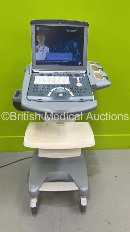 GE Voluson i Portable Ultrasound Scanner *S/N B02259* **Mfd 2009** on GE Voluson Stand (Powers Up) *C1039*