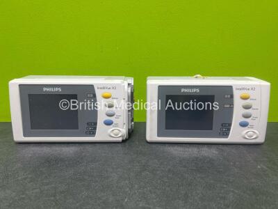 2 x Philips IntelliVue X2 Handheld Patient Monitors Including ECG, SpO2, NBP, Press and Temp Options (Both Untested, 1 x with damage to casing - See Photos)