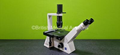 Carl Zeiss Axiovert 25 Benchtop Microscope (Powers Up) with 2 x PL 10 x / 18 Eyepieces and 5 x Optics Including 1 x CP-ACHROMAT 5x / 0,12 , 1 x plan-NEOFLUAR 2,5x / 0,075 , 1 x LD A-Plan 32x / 0,40 Ph1 , LD A-Plan 20x / 0,30 Ph1 and 1 x CP-ACHROMAT 10x /