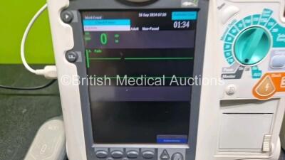 2 x Philips Heartstart MRx Defibrillator (Both Power Up) Including Pacer, ECG and Printer Options with 2 x Philips M3539A Modules, 2 x Philips M3538A Li-Ion Batteries, 2 x Paddle Lead, 1 x Laerdal QCPR Meter, 2 x M3725A Test Loads and 2 x 3 Lead ECG Lead - 5