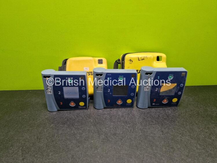 Job Lot Including 1 x Philips FR2+ Defibrillator (No Power) 1 x Laerdal FR2+ Defibrillator (Powers Up with Faulty Screen, 1 x Laerdal FR2 Defibrillator (Powers Up) with 2 x Cases 1 x and LiMno2 Battery