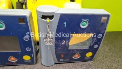 Job Lot Including 1 x Philips FR2+ Defibrillator (No Power) 1 x Laerdal FR2+ Defibrillator (Powers Up with Faulty Screen, 1 x Laerdal FR2 Defibrillator (Powers Up) with 2 x Cases 1 x and LiMno2 Battery - 3