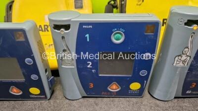 Job Lot Including 1 x Philips FR2+ Defibrillator (No Power) 1 x Laerdal FR2+ Defibrillator (Powers Up with Faulty Screen, 1 x Laerdal FR2 Defibrillator (Powers Up) with 2 x Cases 1 x and LiMno2 Battery - 4