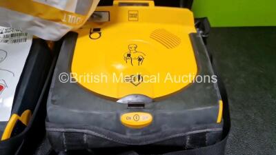 4 x Physio Control Lifepak CR Plus Defibrillators (All Power Up) in Case with 4 x Li/SO2CI2 Batteries - 4