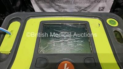 2 x Zoll AEDPro Defibrillators (Both Power Up, Both with Damage to Screen - See Photo) in Case with 2 x 3 Lead ECG Leads and 2 x Li-ion Batteries - 4