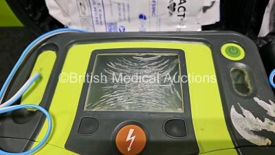 2 x Zoll AEDPro Defibrillators (Both Power Up, Both with Damage to Screen - See Photo) in Case with 2 x 3 Lead ECG Leads and 2 x Li-ion Batteries - 5