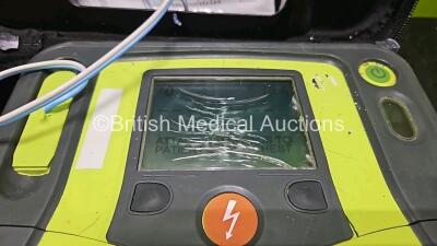 2 x Zoll AEDPro Defibrillators (Both Power Up Both with Damage to Screen - See Photo) in Case with 2 x 3 Lead ECG Leads and 2 x Li-ion Batteries - 4