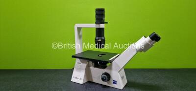 Carl Zeiss Axiovert 25 Benchtop Microscope (Powers Up) with 2 x PL 10 x / 18 Eyepieces and 4 x Optics Including 1 x CP-ACHROMAT 5x / 0,12 , 1 x CP-ACHROMAT 10x / 0,25 Ph1, 1 x ACHROSTIGMAT 20x / 0,30 Ph1 and 1 x ACHROSTIGMAT 40x / 0,55 Ph2