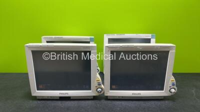 4 x Philips IntelliVue MP70 Patient Monitors (All Power Up, 3 x with Damaged Button - See Photos)