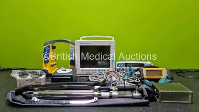 Mixed Lot Including 1 x Laerdal LSU Suction Unit (Powers Up and Cracked Casing) 1 x Datex-Ohmeda S/5 Patient Monitor (No Power and Missing Dial - See Photo), 1 x Storz 3D Fogless Polarized Glass, 1 x System One Humidifier, 1 x Clipper Footswitch, 2 x Tri-