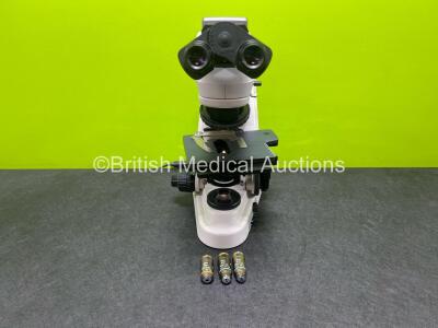 Nikon Eclipse 50i Benchtop Microscope with 2 x CFI 10x/22 Eyepieces and 3 x Optics Including 1 x PLAN 10x/0.25, 1 x PLAN 40x/0.65, and 1 x 20x/0.40 (Powers Up with Good Bulb) **SN 911816**