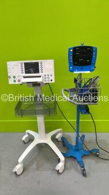 1 x GE Dinamap Carescape V100 Vital Signs Monitor on Stand with BP Hose and Cuff and 1 x Huntleigh Sonicaid FM800 Fetal Monitor on Stand (Both Power Up)