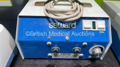 Mixed Lot Including 1 x Sharpsafe Danger Bin, 1 x Seward Medical High Performance Light Source, 1 x Quirumed Compressor Nebulizer, 1 x New Aspiret Suction Unit, 1 x Leica AG Reichert Division Unit, 1 x Linak Battery Unit - 4