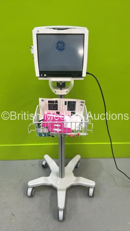 GE Carescape B450 Patient Monitor on Stand with GE Patient Data Module with ECG, Temp/Co, P1/P3, P2/P4, SPO2, NIBP and Defic/Sync Options (Missing Battery) and GE E-miniC Gas Module with Mini D-Fend Water Trap (Powers Up) *S/N SNT20211145HA*