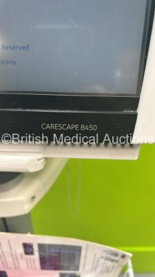 GE Carescape B450 Patient Monitor on Stand with GE Patient Data Module with ECG, Temp/Co, P1/P3, P2/P4, SPO2, NIBP and Defic/Sync Options (Missing Battery) and GE E-miniC Gas Module with Mini D-Fend Water Trap (Powers Up) *S/N SNT20211145HA* - 2