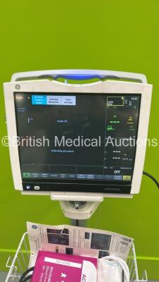 GE Carescape B450 Patient Monitor on Stand with GE Patient Data Module with ECG, Temp/Co, P1/P3, P2/P4, SPO2, NIBP and Defic/Sync Options (Missing Battery) and GE E-miniC Gas Module with Mini D-Fend Water Trap (Powers Up) *S/N SNT20211145HA* - 6