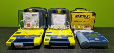 Job Lot Including 2 x Cardiac Science Powerheart AED G3 Defibrillators (Both Power Up) with 2 x Electrodes *Both Expired* and 2 x LiSo2 Batteries in 3 x Carry Cases and 1 x Laerdal Heartstart FR2+ Defibrillator with 1 x Electrode *Expired* in Carry Bag (U