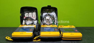 Job Lot Including 2 x Medtronic Lifepak 1000 Defibrillators (Both Power Up with Stock Battery - Stock Battery Not Included) with 1 x 3 Lead ECG Lead and 1 x Electrode *Expiry Date 2025* in Carry Case and 1 x Physio Control Lifepak 1000 Defibrillator (Powe