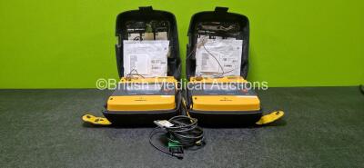 2 x Medtronic Lifepak 1000 Defibrillators (Both Power Up) with 1 x 3 Lead ECG Lead and 2 x Li/MnO2 Batteries *Install Before - 2028 & 2029* and 2 x Electrodes *Both Expired* in Carry Cases *SN 35951656 / 35951813*