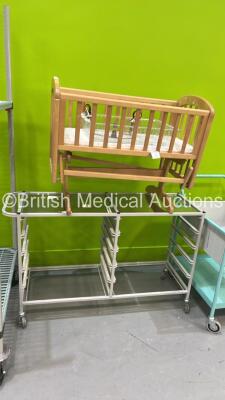 4 x Trolleys, 1 x Mobile Racking Unit and 1 x Infant Cot (Damaged) - 4