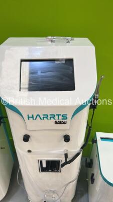 2 x Robotics Harrts Mini Hair Transplant Systems (1 x No Power - 1 x Boots with Blank Screen) and 2 x Robotics Harrts Micro Hair Transplant Systems with Accessories (Both Power Up) - 6