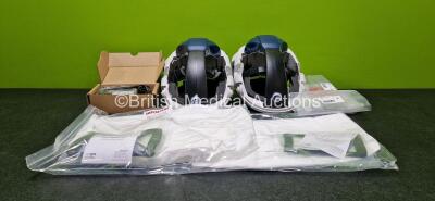 Job Lot Including 2 x Pureflo PF3000P Air Purifying Respirators (Both Power Up with Stock Battery - Stock Battery Not Included and 1 x Missing Back Casing - See Photo) with 2 x Hood Replacements, 1 x Cleaning Plug, 1 x Ear Defender Infills and 1 x Charger