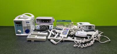 Mixed Lot Including 2 x Abbott Flexiflo Patrol Enteral Pumps, 2 x CME Medical T34 Ambulatory Syringe Pumps (Both Power Up), 1 x Nellcor N-560 Oximeter, 1 x BCI Autocorr Oximeter, 1 x Masimo Rad-8 Oximeter, 1 x Propulse II Ear Irrigation Unit and 5 x Vario