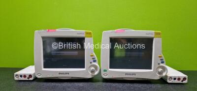 Job Lot Including 2 x Philips IntelliVue MP30 Touchscreen Patient Monitors (Both Power Up and 1 x Damaged Casing - See Photos) with 4 x Lithium Batteries and 2 x Philips M3001A Opt A01C18 Module Including ECG/Resp, SpO2, NBP, Press and Temp Options (1 x C