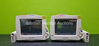 Job Lot Including 2 x Philips IntelliVue MP30 Touchscreen Patient Monitors (Both Power Up, 1 x Damaged Button, 1 x Scratched Screen and 1 x Cracked Casing - See Photos) with 2 x Lithium Batteries and 2 x Philips M3001A Opt A01C06 Module Including ECG/Resp