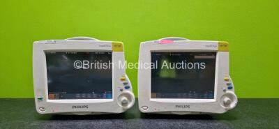 2 x Philips IntelliVue MP30 Touchscreen Patient Monitors (Both Power Up and 1 x Damaged Button - See Photo) with 3 x Lithium Batteries