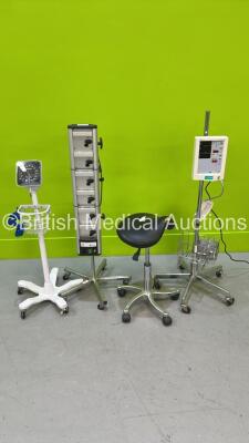 Mixed Lot Including 1 x Datascope Accutorr Plus Monitor on Stand (Powers Up) 1 x Well Life Saddle Stool (Some Damage) 1 x Alaris Docking Station and 1 x Welch Allyn BP Meter on Stand