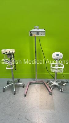 Mixed Lot Including 1 x Edan SD5 Ultrasonic TableTop Doppler Unit on Stand (Powers Up) 1 x Ardo Amenic Unit on Trolley (Powers Up) and 1 x Welch Allyn 767 Transformer on Stand