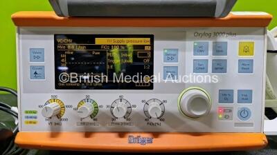 Drager Oxylog 3000 Plus Transport Ventilator Software Version 01.08 *Mfd 2014* Ref 5704811-18 (Powers Up, Damaged Casing - See Photo) with 1 x Lithium Battery and 1 x Hose - 3