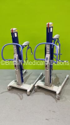 2 x Arjo MaxiMove Electric Patient Hoists with 2 x Batteries and 2 x Controllers (Both Power Up)