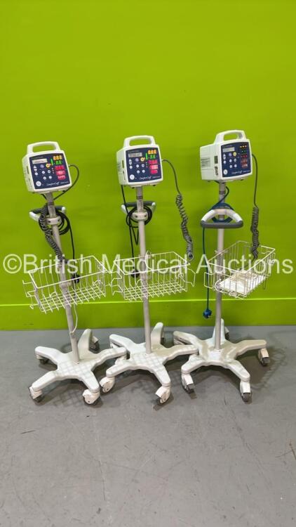 3 x CSI Criticare ComfortCuff 506N3 Series Vital Signs Monitors on Stands (All Power Up) *SN 312720507 / na*